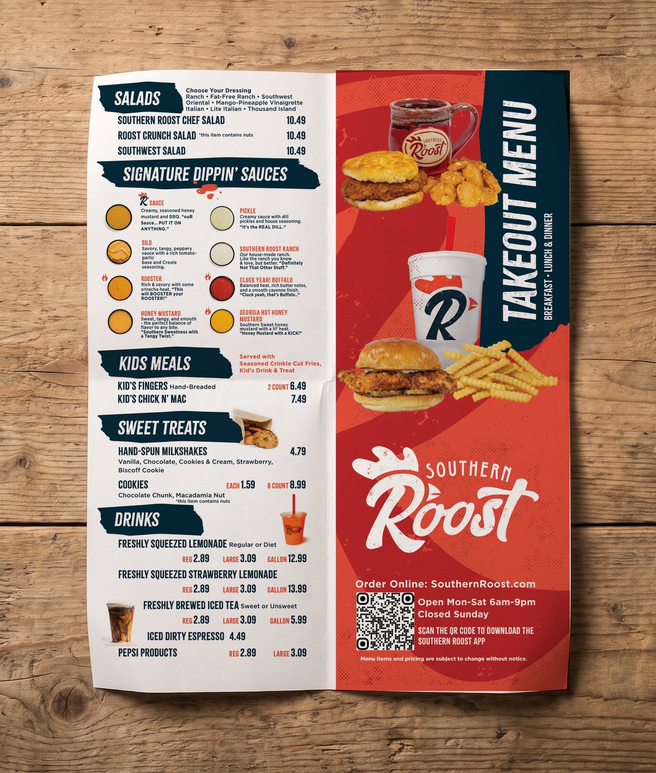 Southern Roost takeout menu unfolded flat on a wood table — real menu design from the in-house years